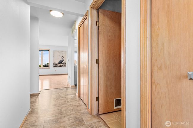 Entry towards the LR, the laundry and utility room and 2 closets provides lots of storage. | Image 28