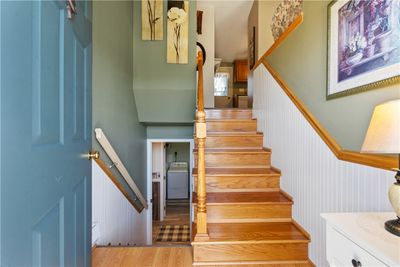 Beautiful entry with wainscot accent. | Image 3