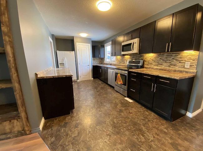 5620 50 Avenue S, House other with 6 bedrooms, 3 bathrooms and 2 parking in Killam AB | Image 11