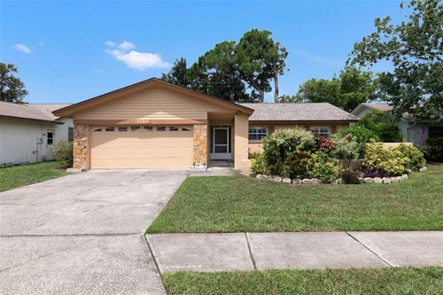 1150 Brook Dr W, DUNEDIN, FL, 34698-4644 | Card Image