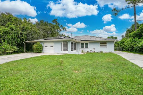 1074 Darby Dr Nw, PORT CHARLOTTE, FL, 33948-3774 | Card Image