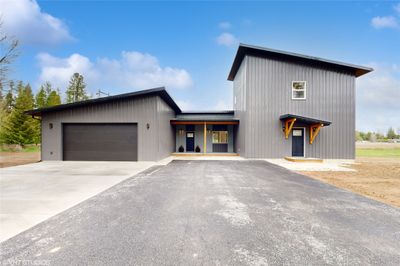 Newly finished home on 1 acre with oversized driveway! | Image 1