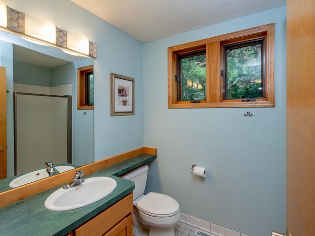 Upper level ensuite 3/4 bathroom. | Image 20