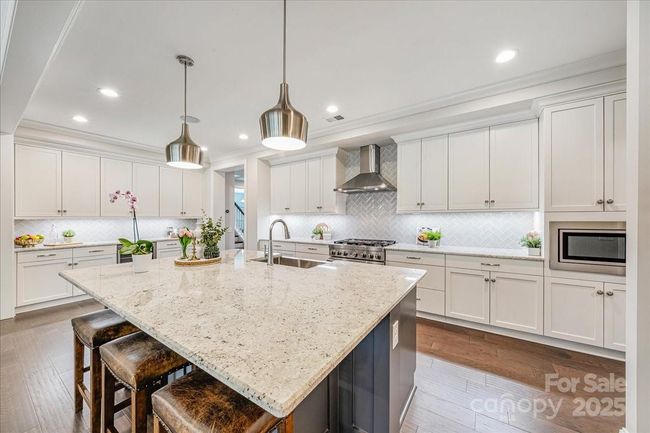 Oversized kitchen island perfect for family and entertaining | Image 12