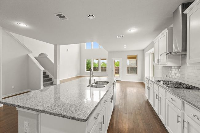 Looking from the kitchen to the back of the house. | Image 9