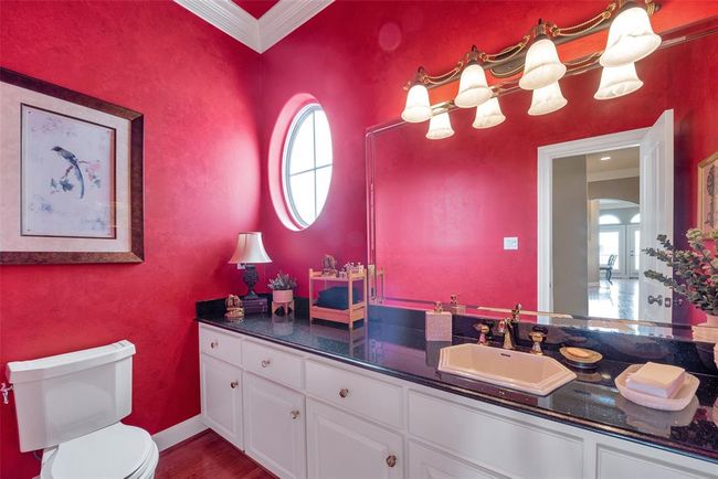 Half bathroom is located on the 1st level. | Image 30