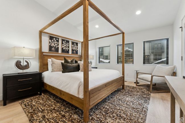 Bedroom with light hardwood / wood-style flooring | Image 18