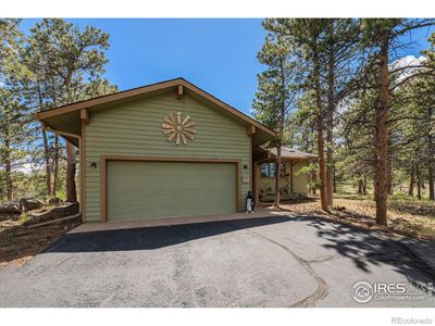 939 Fox Acres Drive W, House other with 3 bedrooms, 2 bathrooms and 2 parking in Red Feather Lakes CO | Image 2