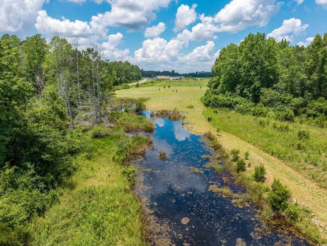 Drone / aerial view of a nearby body of water | Image 13