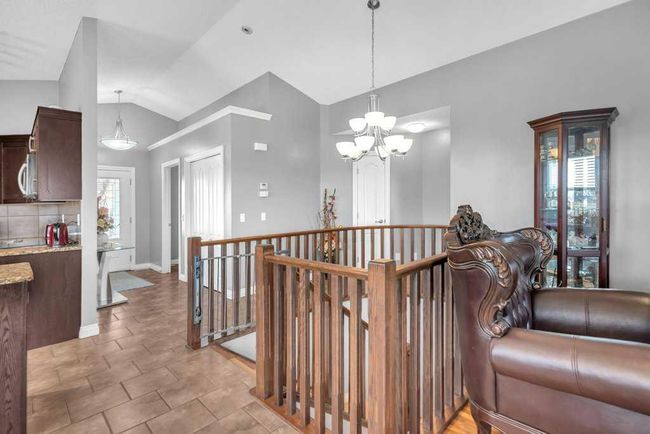 100 Rainbow Falls Row, Home with 4 bedrooms, 2 bathrooms and 4 parking in Chestermere AB | Image 4