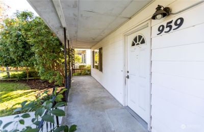 A covered front porch keeps you dry when you want to be outside. | Image 3