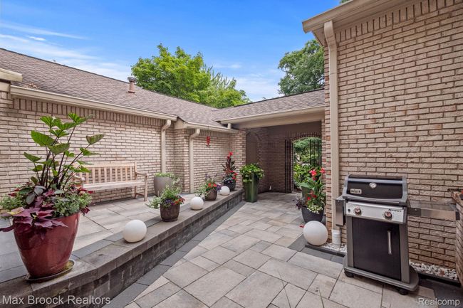 Gated courtyard with brick pavers. . . | Image 7