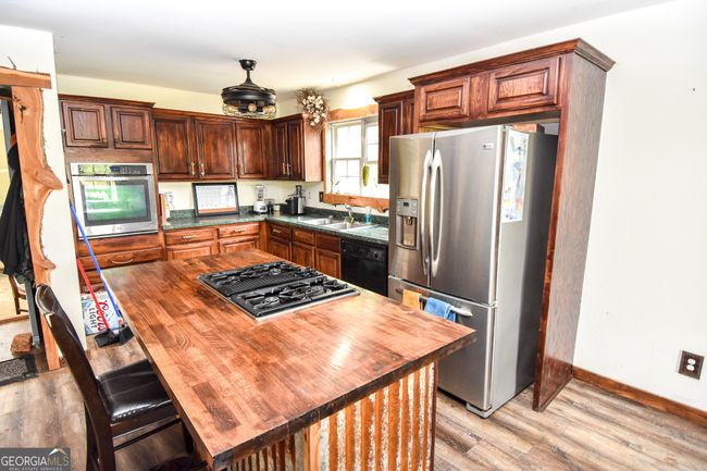 387 Fredonia Church Rd, Home with 3 bedrooms, 2 bathrooms and 2 parking in BARNESVILLE GA | Image 18