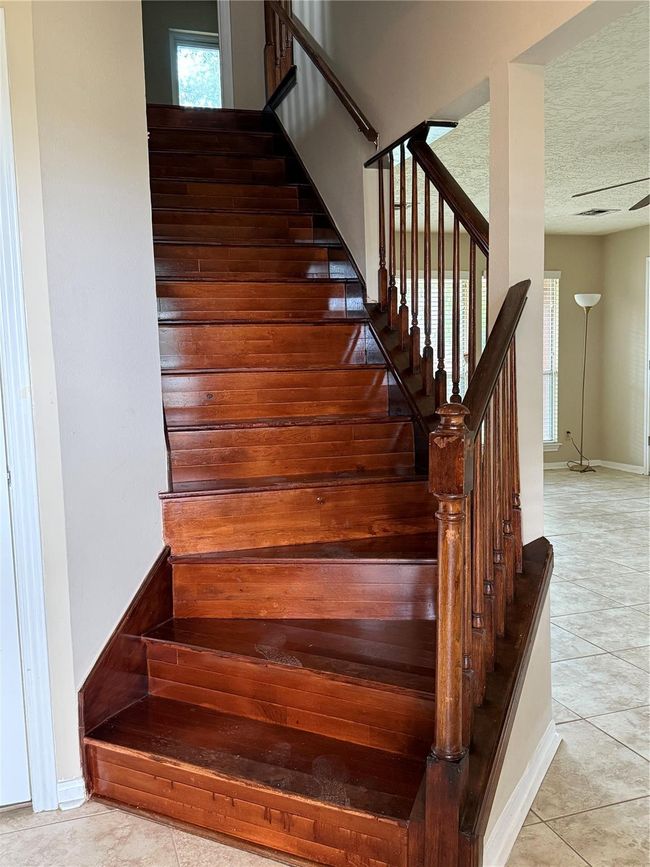 Beautiful mahogany colored staircase. | Image 4