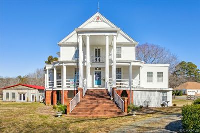 View of front of property featuring a porch and a front lawn | Image 2