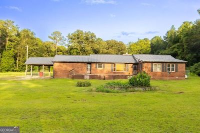 4880 Dixon Road, House other with 3 bedrooms, 2 bathrooms and 3 parking in Lizella GA | Image 1