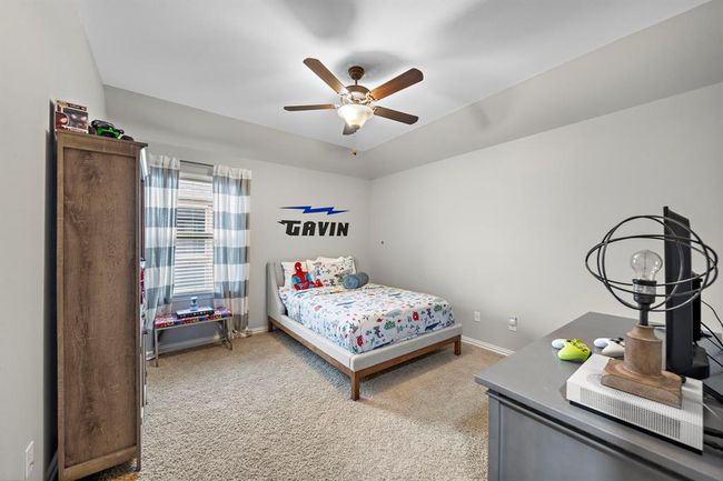 Secondary bedroom offerings a walk-in closet. | Image 28
