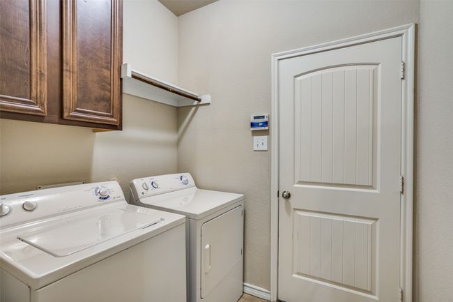 Laundry room with washing machine and dryer and cabinet space | Image 22