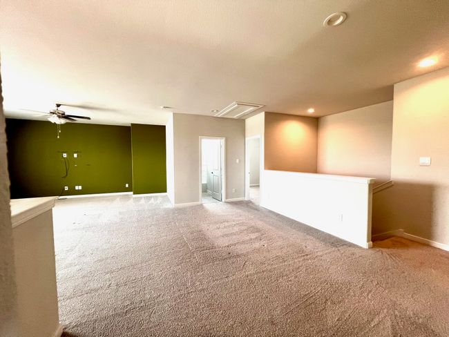 Carpeted spare room with a ceiling fan and recessed lighting | Image 22