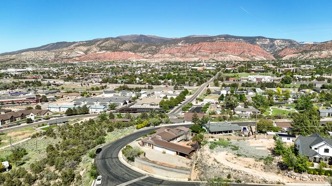 Aerial perspective of suburban area with a mountainous background | Image 60