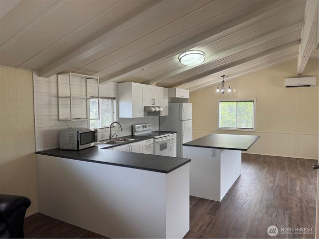 Kitchen with island lots of cabinet space | Image 5