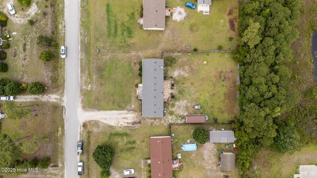 Fenced in backyard. | Image 35