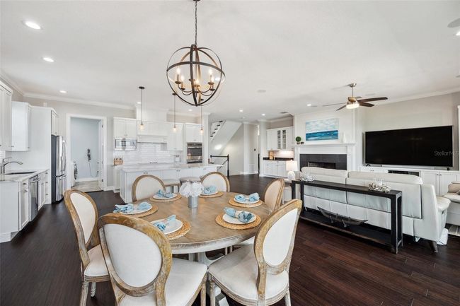 Open concept living space! Pantry/laundry room is to the back left. Also on the 2nd level is the primary master suite, and a second bedroom and full bath. | Image 35
