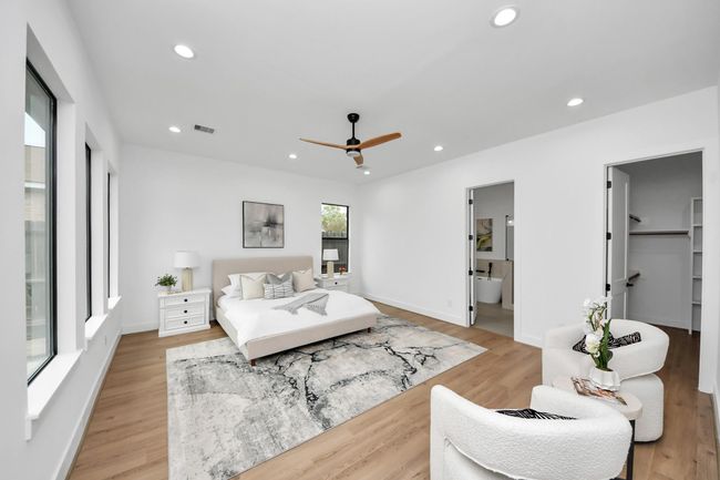 Step into the sanctuary of theprimary bedroom. | Image 12