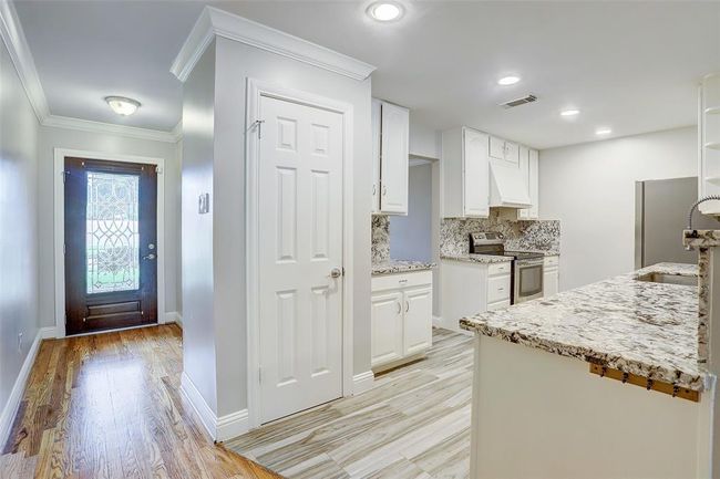 View from den to the front door | Image 12