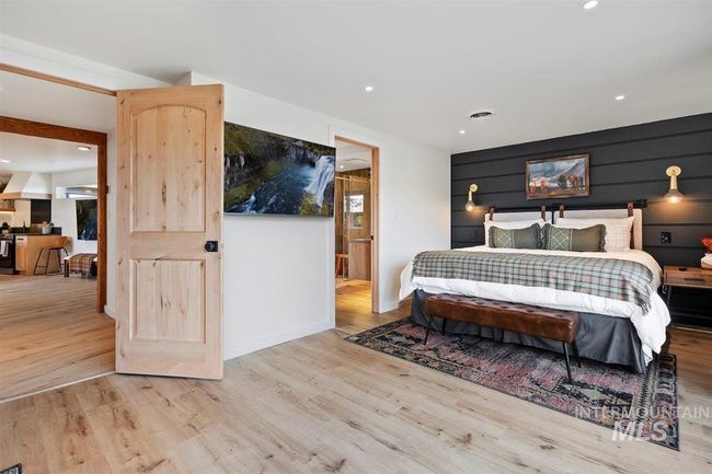 Bedroom featuring light wood-type flooring and recessed lighting | Image 40