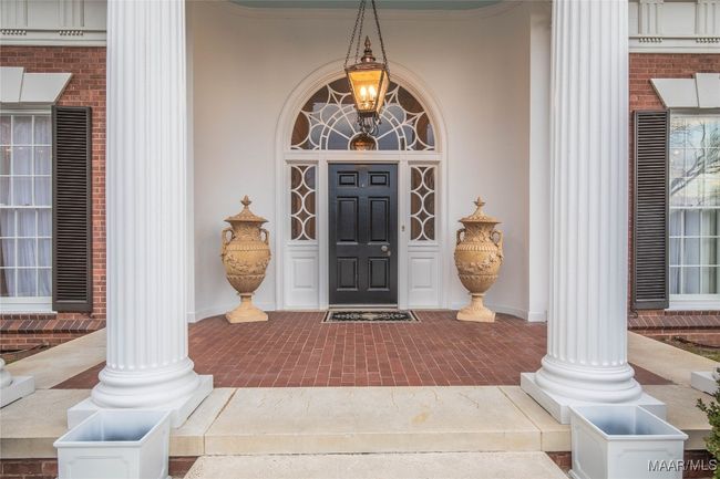 Fabulous entry door with custom arches and side lights | Image 46