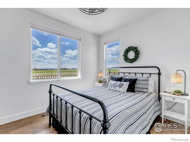 5th Bedroom located on the main floor is perfect for guests! | Image 17
