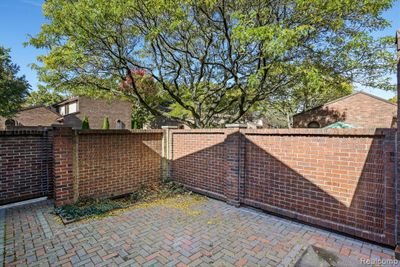 Private brick paved entry courtyard | Image 2