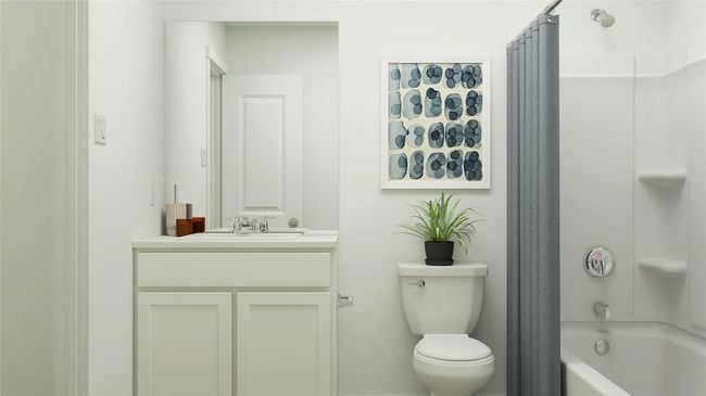 Bathroom featuring vanity, toilet, and shower / bath combo | Image 22