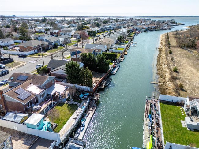 Drone / aerial view featuring a residential view and a water view | Image 36