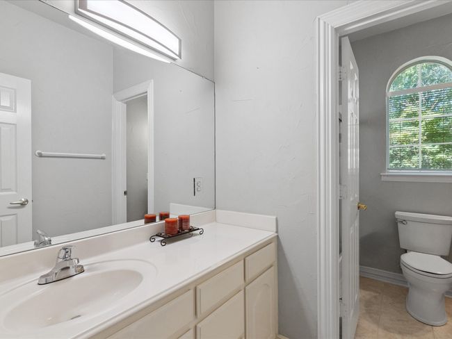 Bathroom featuring vanity and tile patterned floors | Image 18