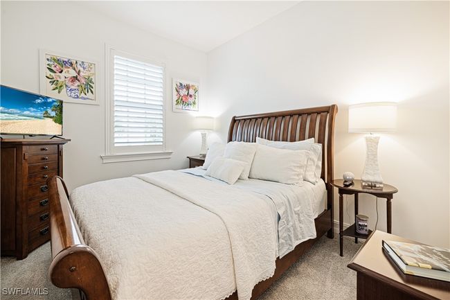 Bedroom with carpet | Image 20