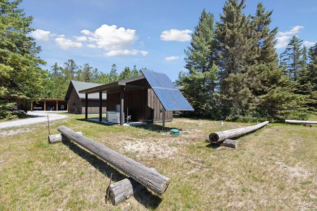 Parking outside of logs | Image 63