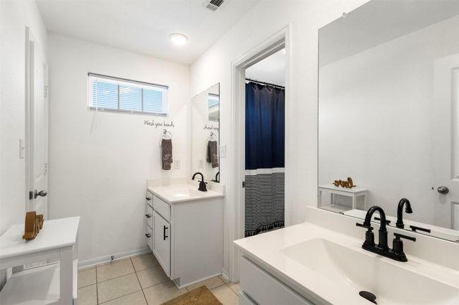 Full bath with two vanities and tile flooring | Image 22