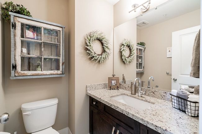 Half bath with toilet and vanity | Image 12