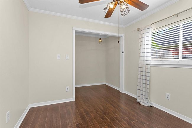 This secondary bedroom has tons of space, natural light, and storage. | Image 24