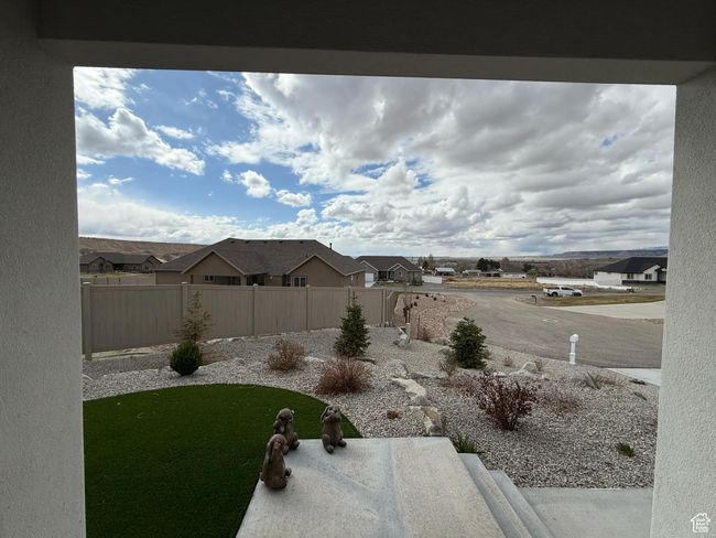 View of yard with a residential view and fence | Image 75