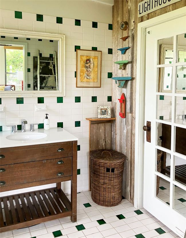 Bathroom featuring vanity, tile patterned floors, and tile walls | Image 17