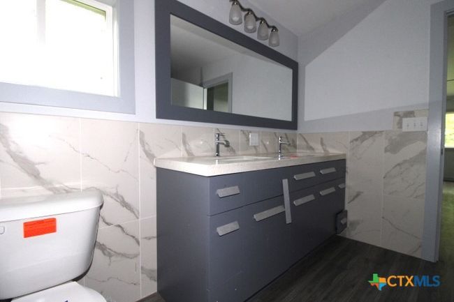203 Spring St, House other with 4 bedrooms, 3 bathrooms and null parking in Lampasas TX | Image 11