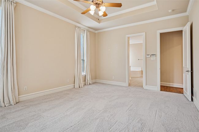 Primary bedroom with en-suite bathroom and large walk-in closet | Image 20
