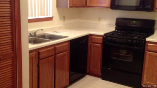 apt-103-411 Ford Ave, Wyandotte, MI, 48192-4059 | Card Image