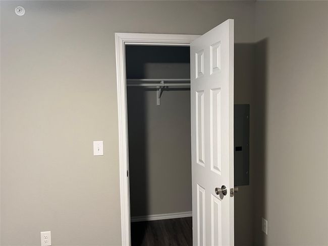 Closet featuring electric panel | Image 4