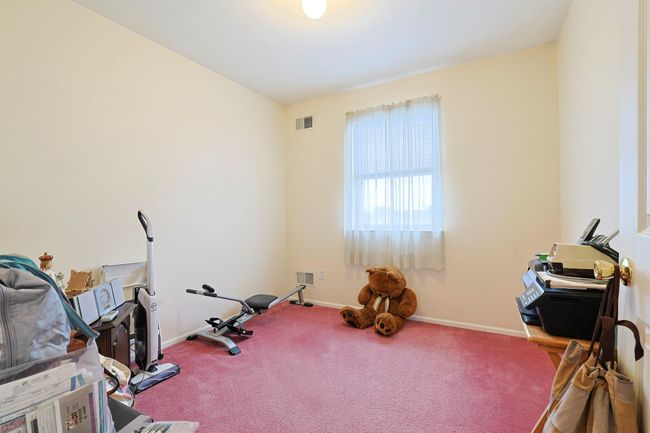 Workout room with baseboards, carpet, and visible vents | Image 11