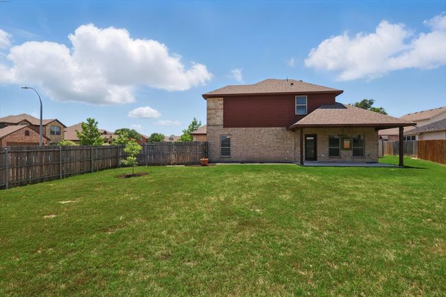 Back of property with a patio and brick siding | Image 33