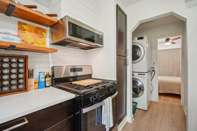 View from kitchen thru utility to bedroom. | Image 14